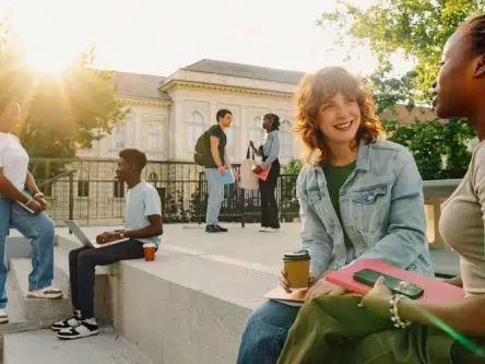 diverse-students-sitting-and-standing-on-stairs-at-2024-06-28-04-58-22-utc-1-scaled (1) (1) (1)